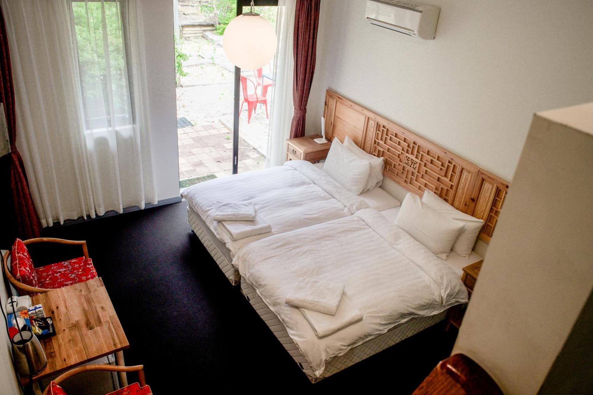 Отель Sinofield Edu-Retreat Лора Экстерьер фото